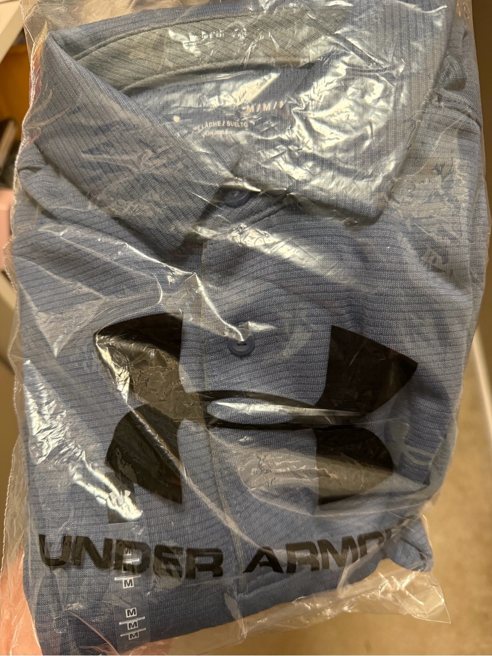Under Armour Men’s Blue Polo Shirt with Black Logo